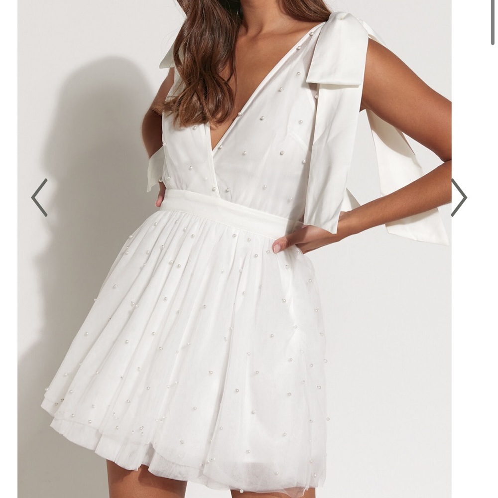 Showpo White Mini Dress Chic and Stylish